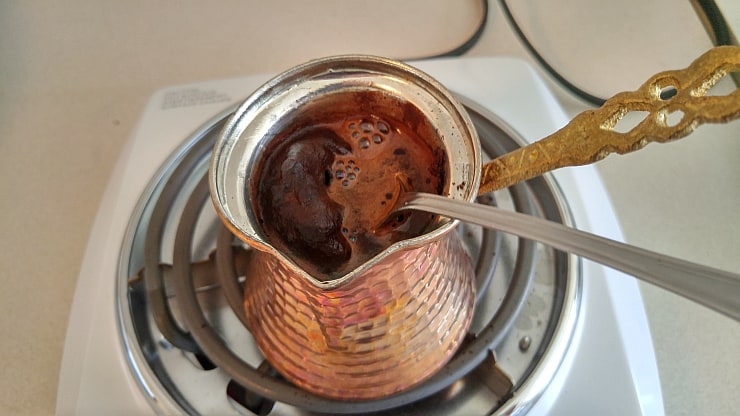 Turkish Coffee Brewing In Cezve